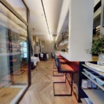Interior walkway and bar seating area at Bella Cucina in Dalkey