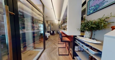 Interior walkway and bar seating area at Bella Cucina in Dalkey