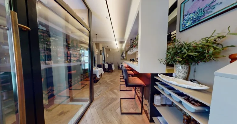 Interior walkway and bar seating area at Bella Cucina in Dalkey