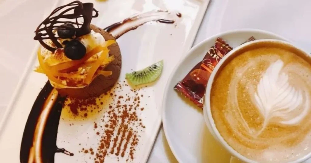 Italian dessert served with cappuccino and chocolate decoration